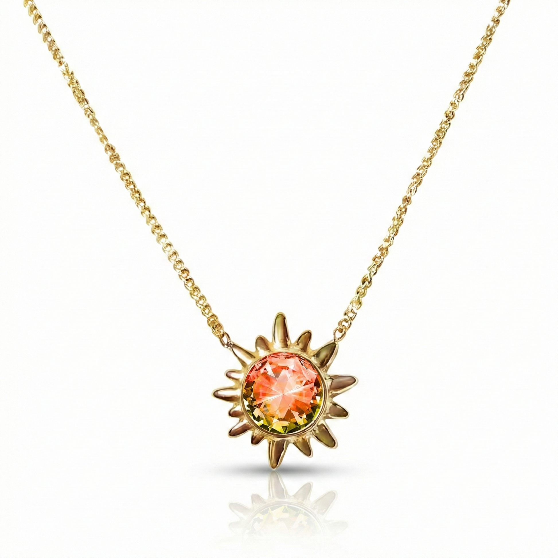 Sunburst Crystal Necklace features a 16"-18" 18K gold stainless steel adjustable chain with 5mm fire stone.
