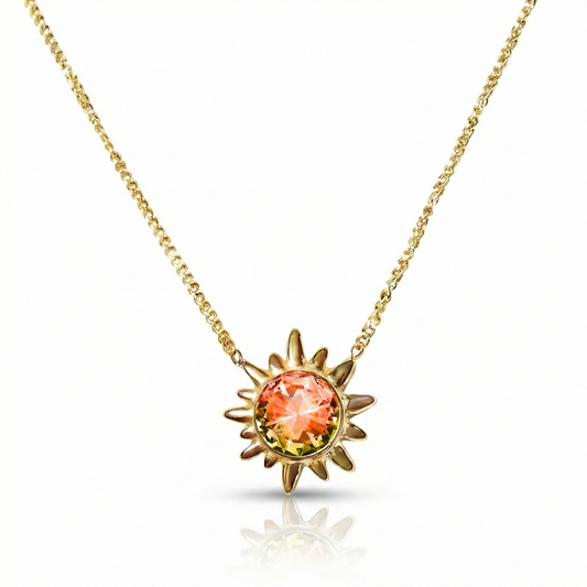 Sunburst Crystal Necklace features a 16"-18" 18K gold stainless steel adjustable chain with 5mm fire stone.