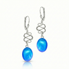 Swirl Extension Earrings  featuring a brilliant display of our signature polished blue crystal. Crafted with high-quality sterling silver components, they include secure lever backs to ensure a comfortable fit.