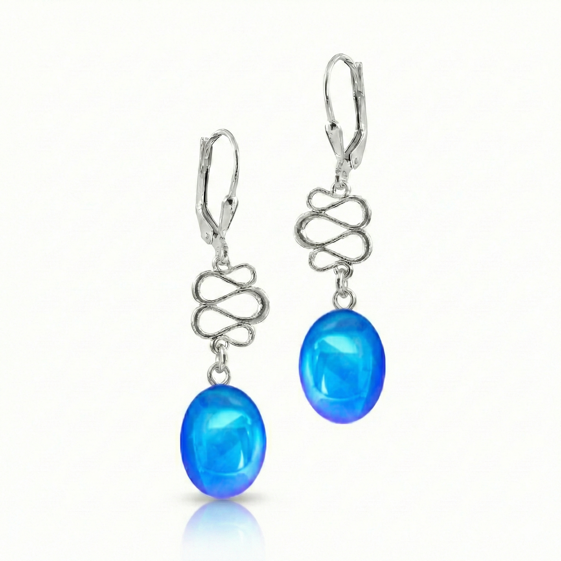 Swirl Extension Earrings  featuring a brilliant display of our signature polished blue crystal. Crafted with high-quality sterling silver components, they include secure lever backs to ensure a comfortable fit.