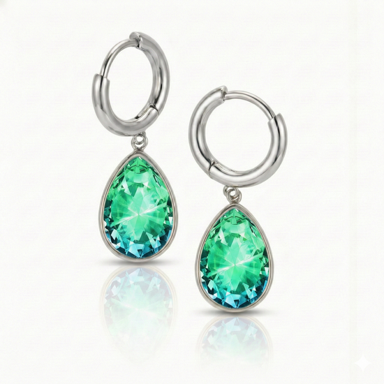 Teardrop Crystal Earrings are meticulously crafted to catch the light and add a dash of elegance with 9 mm green stone and 11mm diameter silver stainless hoop.