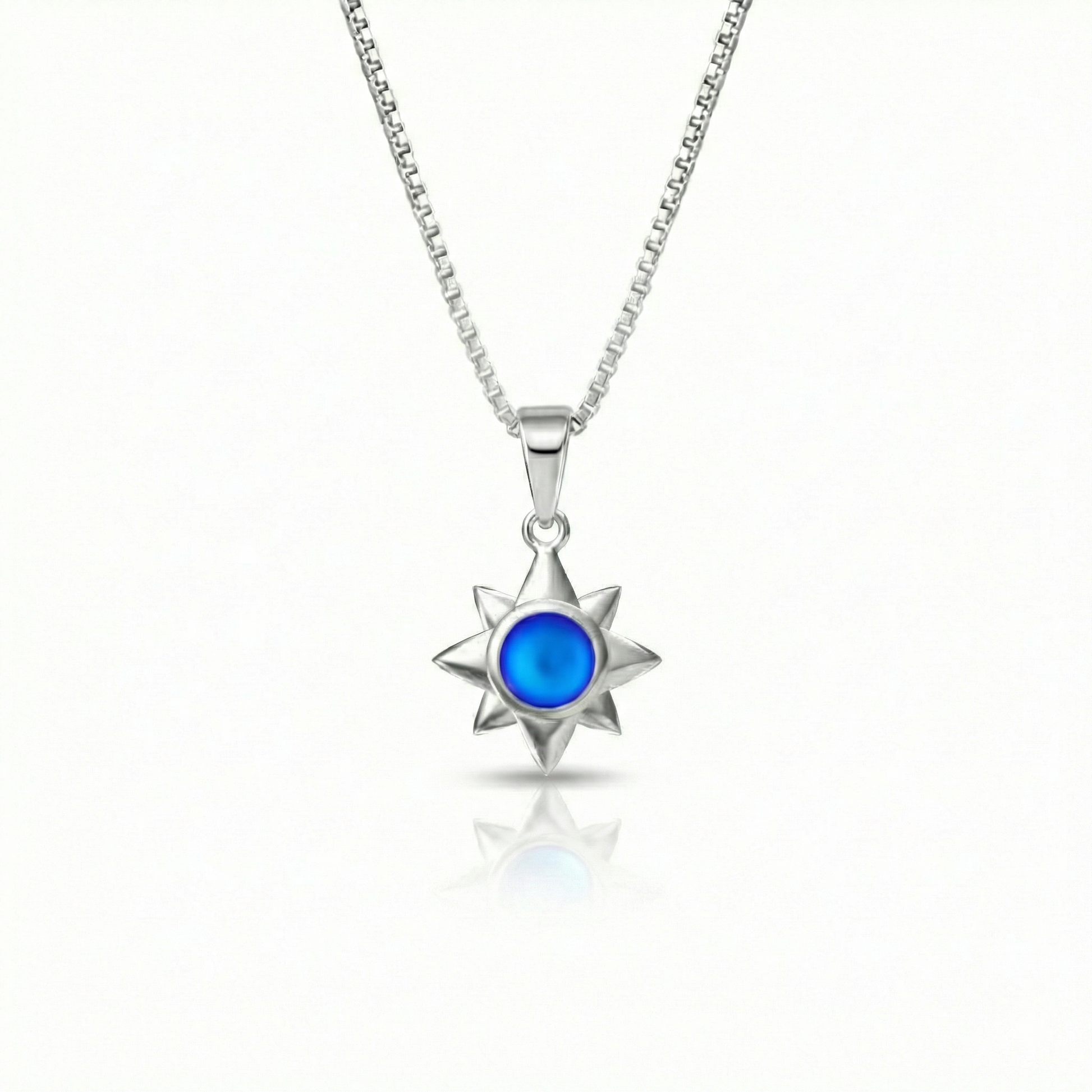 Teeny Star Pendant made with love and crafted with care, comes with an 18" sterling silver chain and 5 mm frosted blue stone. 