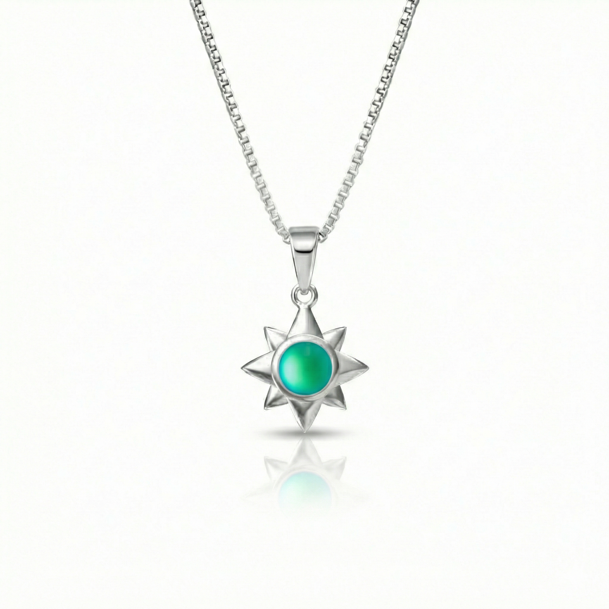 Teeny Star Pendant made with love and crafted with care, comes with an 18" sterling silver chain and 5 mm frosted green stone. 