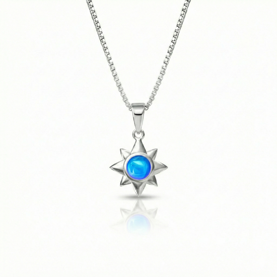 Teeny Star Pendant made with love and crafted with care, comes with an 18" sterling silver chain and a 5 mm polished blue stone. 
