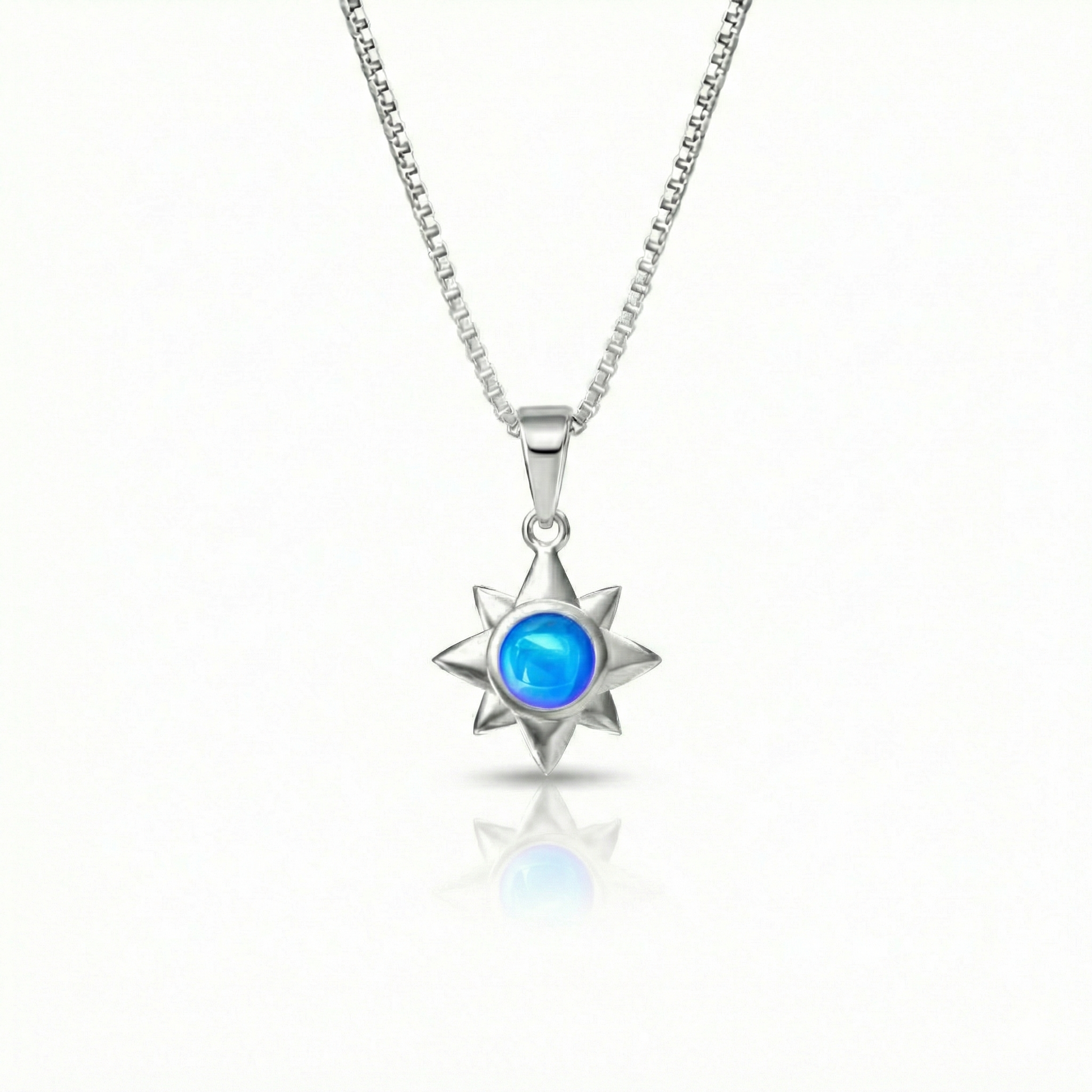 Teeny Star Pendant made with love and crafted with care, comes with an 18" sterling silver chain and a 5 mm polished blue stone. 