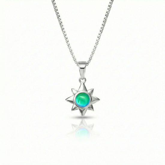 Teeny Star Pendant made with love and crafted with care, comes with an 18" sterling silver chain and 5 mm polished green stone. 