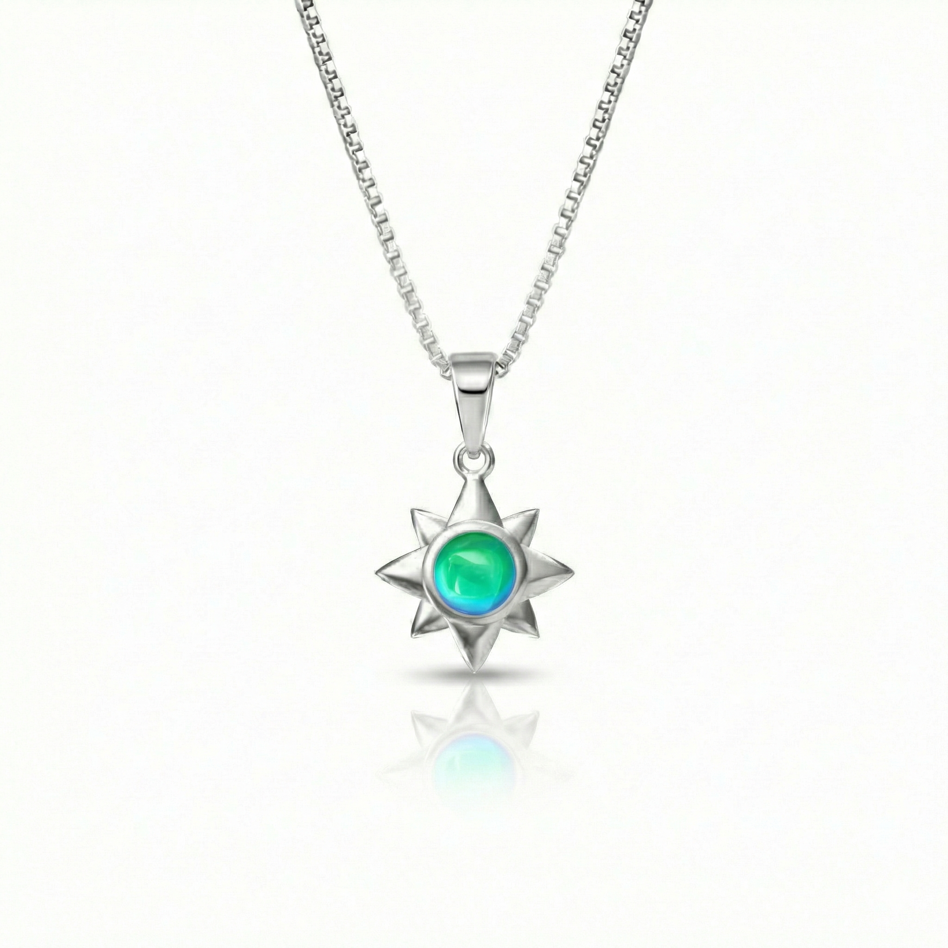 Teeny Star Pendant made with love and crafted with care, comes with an 18" sterling silver chain and 5 mm polished green stone. 