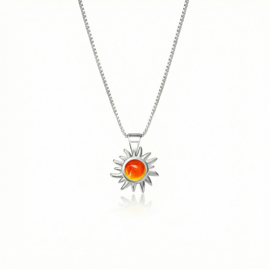  Teeny Sun Pendant crafted from high-quality .925 sterling silver. Featuring a stunning 5mm polished fire stone, it comes complete with an 18" sterling silver box chain.