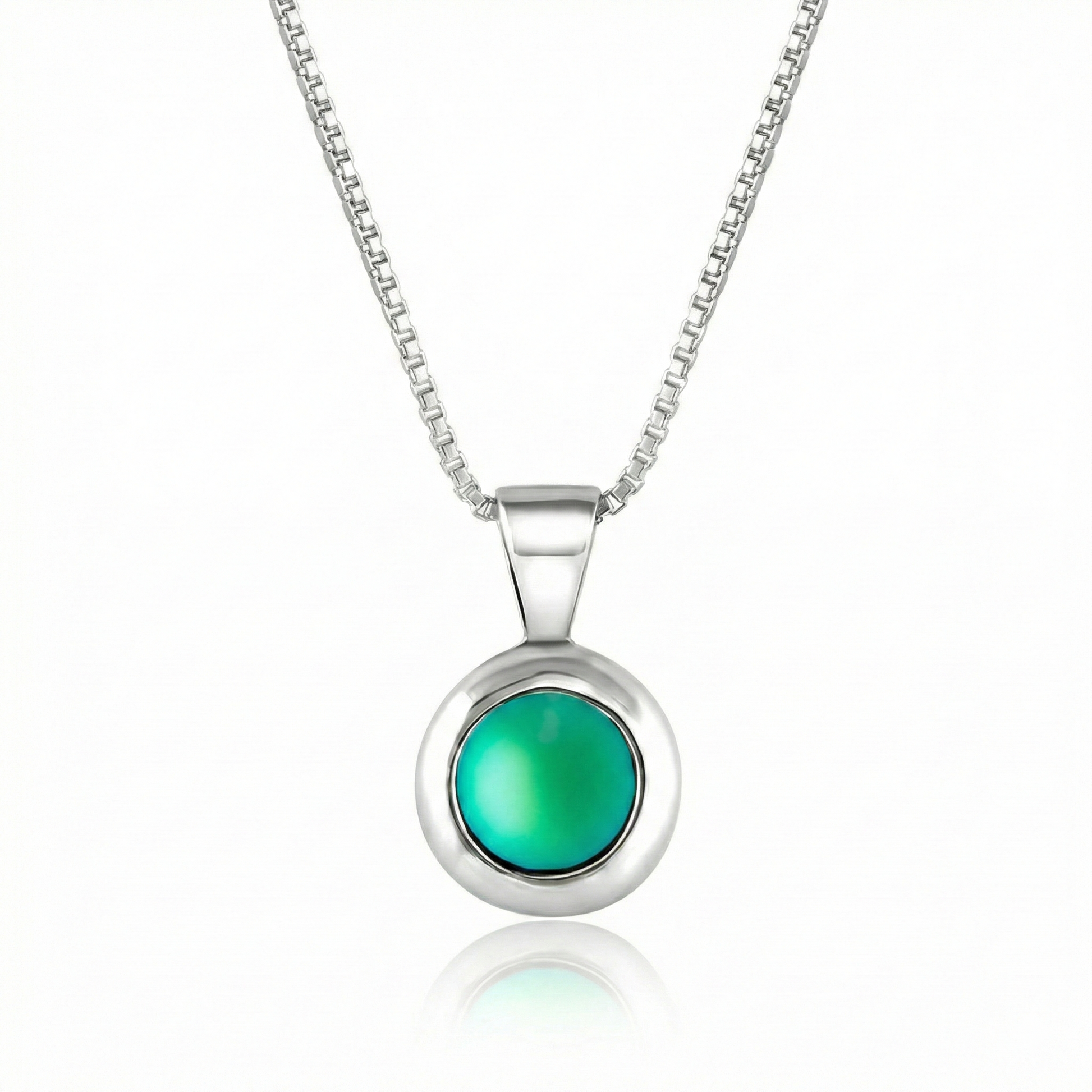 Teeny Tiny Pendant crafted with a thick silver bezel and featuring a stunning 5mm glowing frosted green stone. The pendant comes complete with an 18" sterling silver box chain.