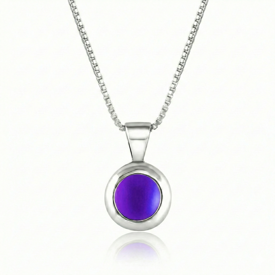 Teeny Tiny Pendant crafted with a thick silver bezel and featuring a stunning 5mm glowing frosted violetstone. The pendant comes complete with an 18" sterling silver box chain.