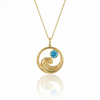 Gold featuring a minimalist ocean wave charm with a blue gemstone on a delicate chain