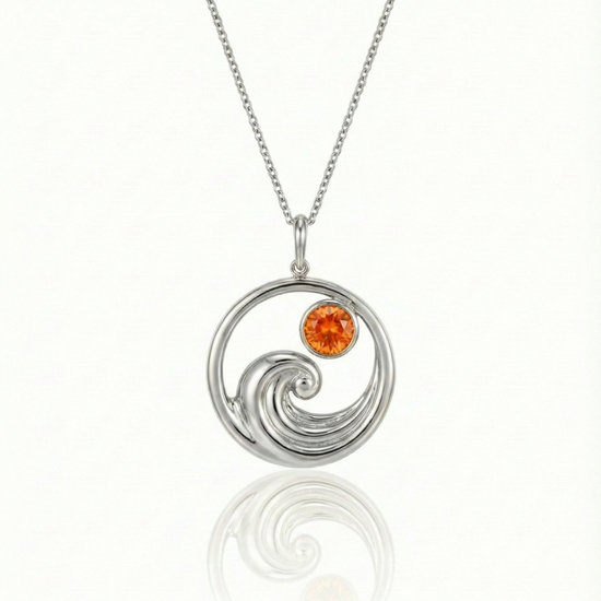 Silver featuring a minimalist ocean wave charm with an orange gemstone on a delicate chain