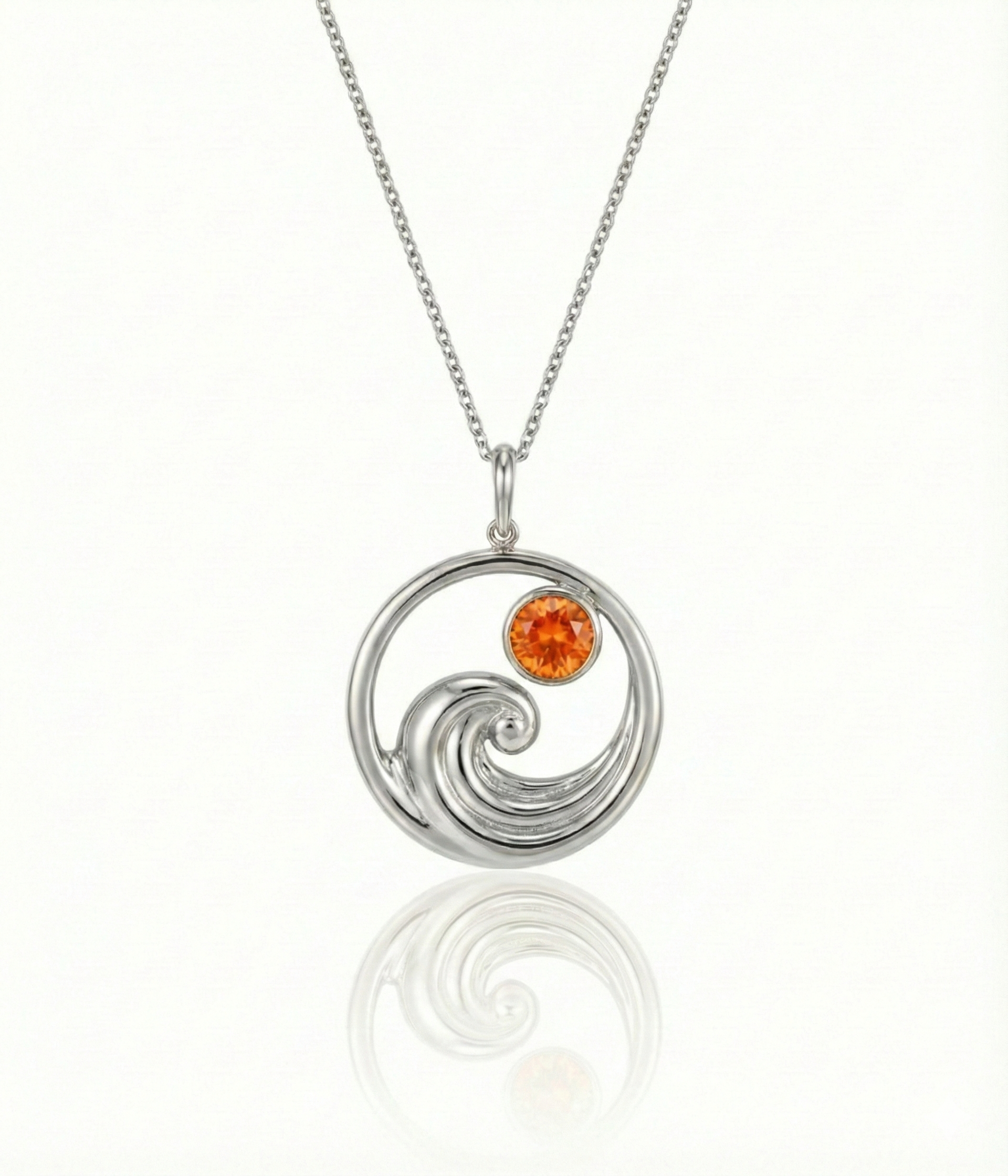 Silver featuring a minimalist ocean wave charm with an orange gemstone on a delicate chain