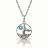 Whale tale pendant with silver stainless steel and a blue gemstone.