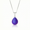 Our best selling crystal X-Small Drop Pendant is a beautiful, easy simple addition to any outfit. Handmade pendants come in a wide variety of colors and shine with an iridescent glow of color from within. Sterling silver .7mm box chain, 18" included with the frosted violet pendant.