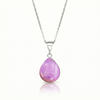 Our best selling crystal X-Small Drop Pendant is a beautiful, easy simple addition to any outfit. Handmade pendants come in a wide variety of colors and shine with an iridescent glow of color from within. Sterling silver .7mm box chain, 18" included with the polished pink pendant.